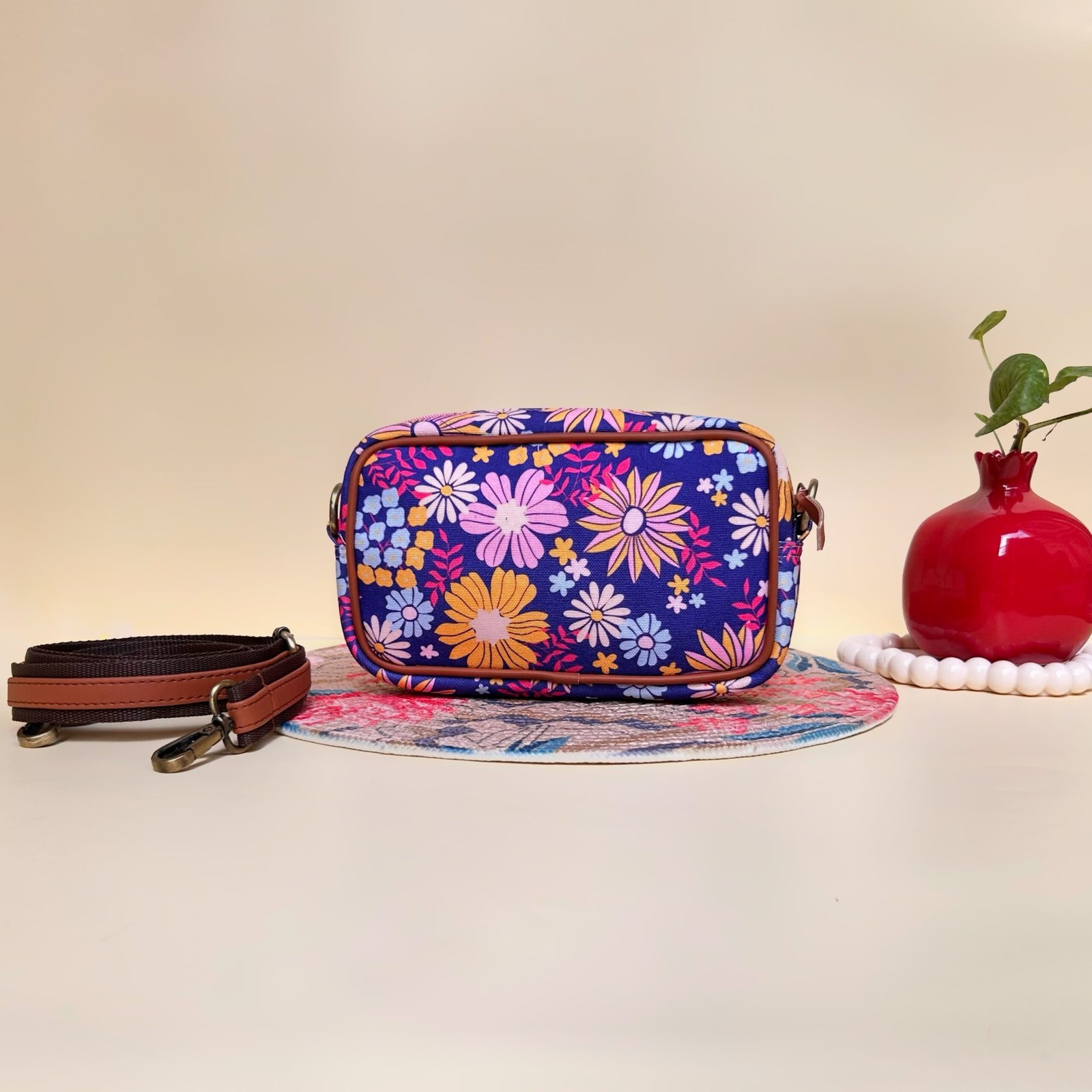 Back view of Flora Charm Printed Sling Bag - Full floral design on vegan leather crossbody.